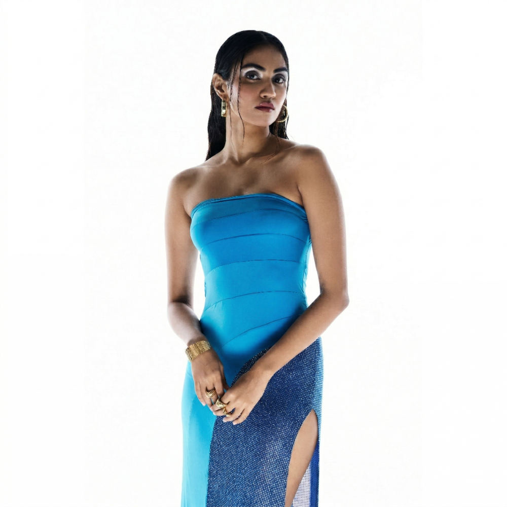 Strapless Swarovski maxi dress with high slit, perfect for parties and nights out. Shop online from our exclusive collection of premium party wear styles.