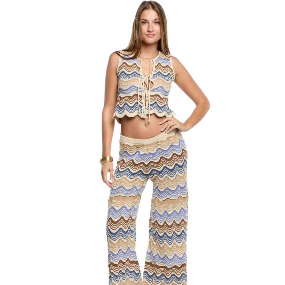 Shop the Kari Knit Pants at TLM, featuring a wavy design, soft stretch fit and artisanal finish. Explore luxury designer fashion on The Luxe Maison website.