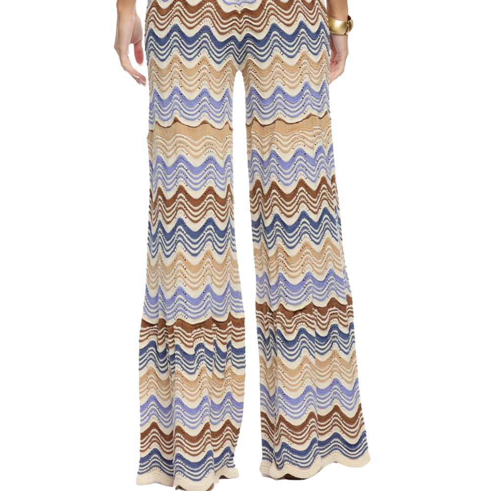 Shop the Kari Knit Pants at TLM, featuring a wavy design, soft stretch fit and artisanal finish. Explore luxury designer fashion on The Luxe Maison website.