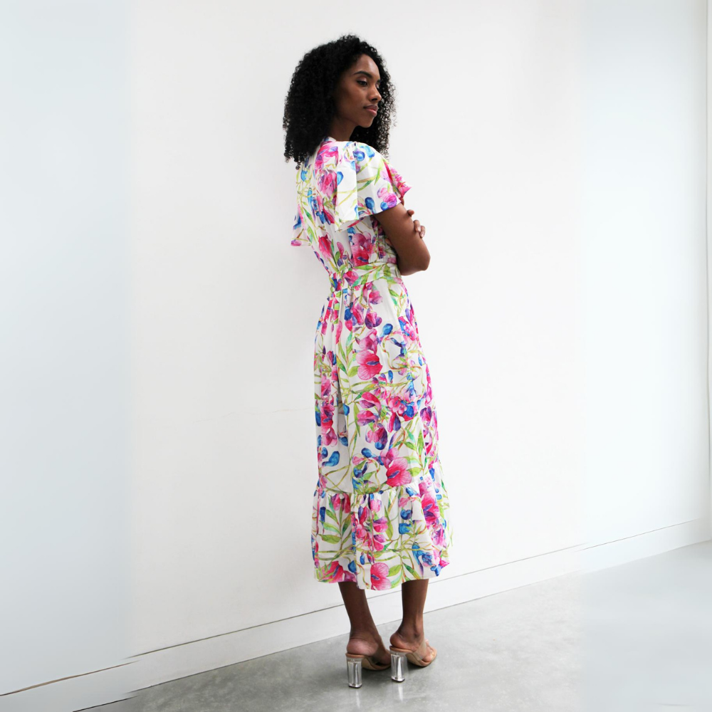 This midi-length dress features a gorgeous pink green and blue floral pattern. 