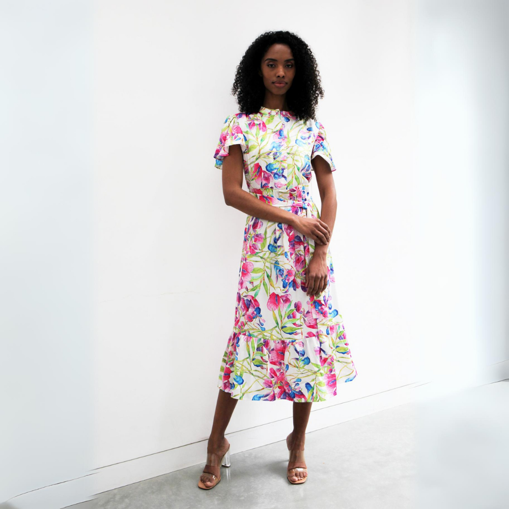 This midi-length dress features a gorgeous pink green and blue floral pattern. 