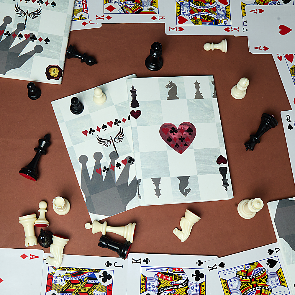 Discover the King Card Notebook at The Luxe Maison, featuring a chessboard-inspired King of Hearts design, translucent vellum cover, and premium pages. Made in Dubai.