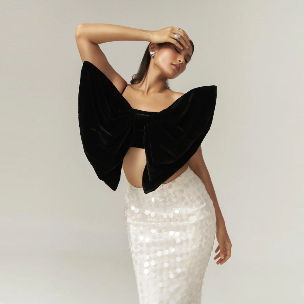 Sequin fish cut skirt with spaghetti top, perfect for parties and date nights. Shop online from our curated edit of premium fashion.