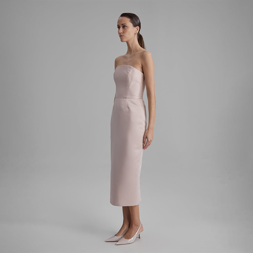 Shop Kira fitted dress in stunning nude color. The strapless neckline accentuates your natural grace. Explore our range of classic dresses. Shop now!