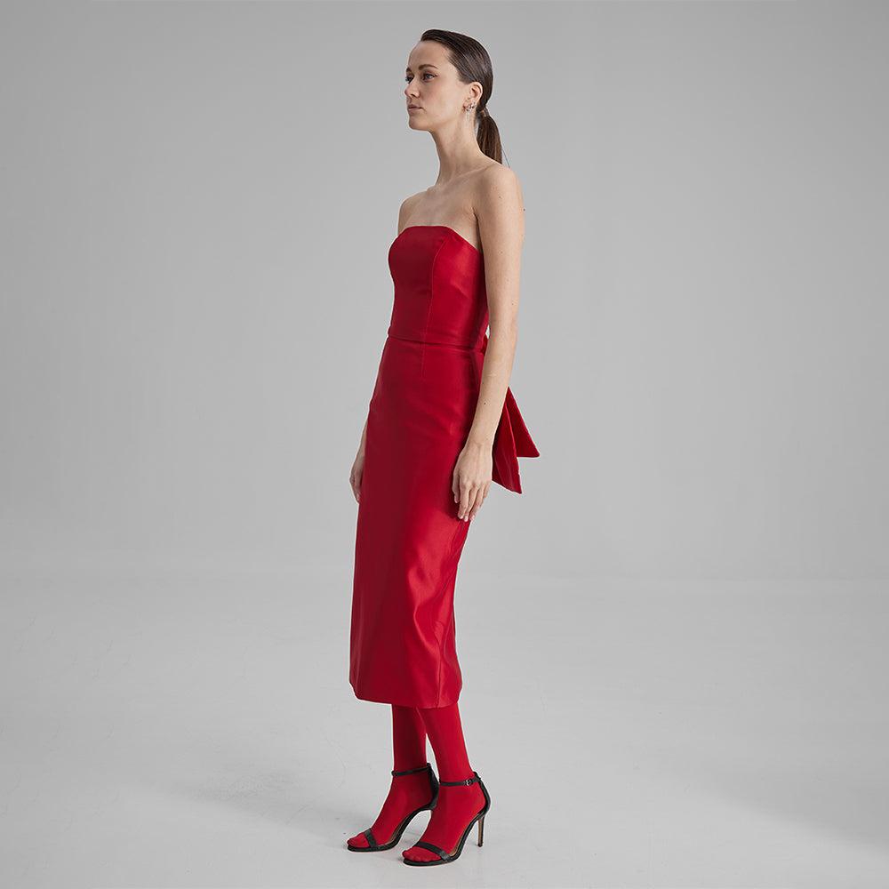 Shop our Kira fitted dress in stunning red color with strapless neckline with a removable side bow. Explore our range of designer dresses. Shop now!