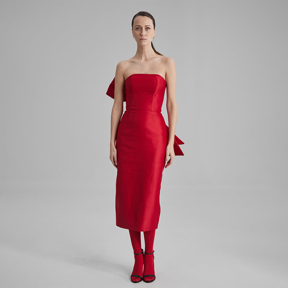 Shop our Kira fitted dress in stunning red color with strapless neckline with a removable side bow. Explore our range of designer dresses. Shop now!