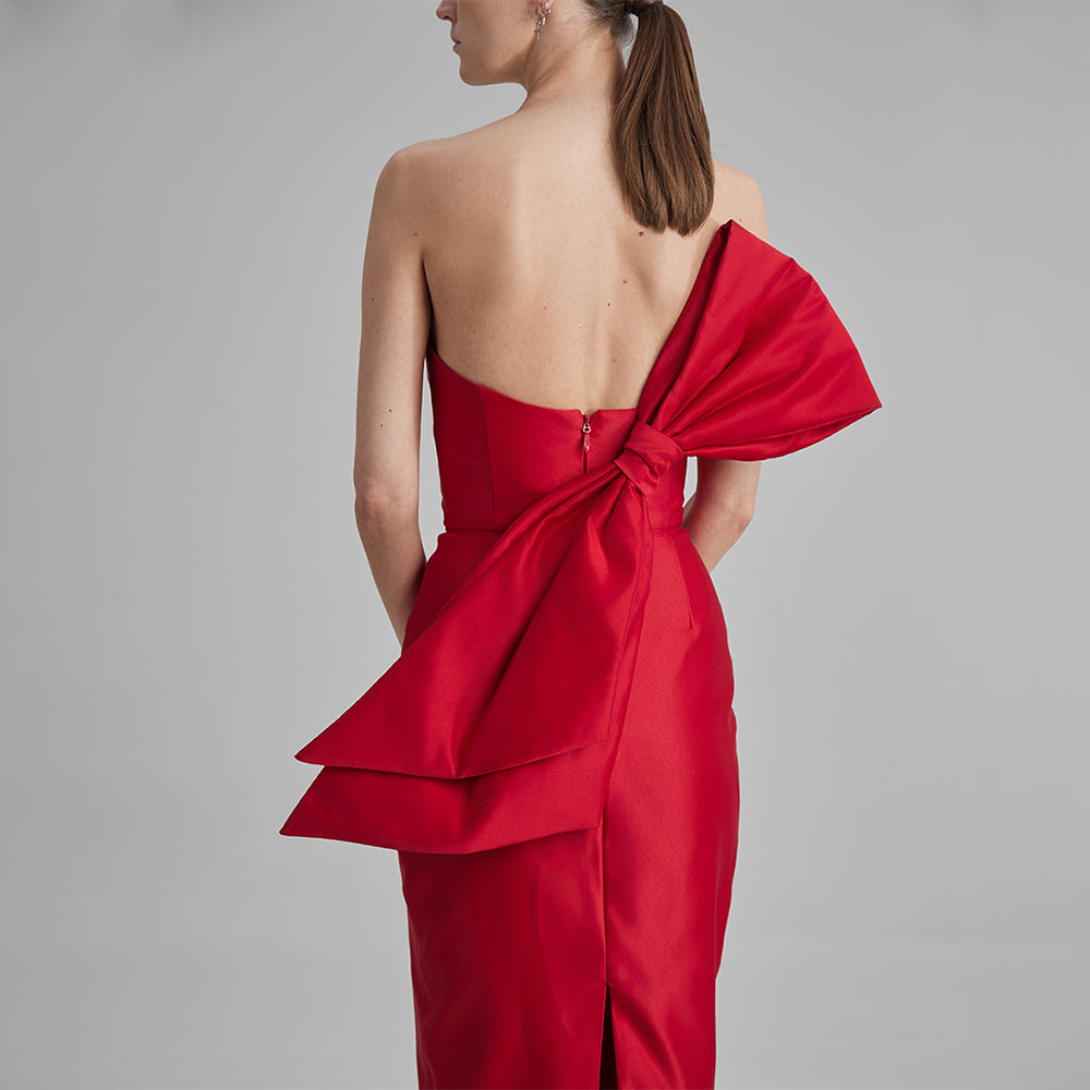 Shop our Kira fitted dress in stunning red color with strapless neckline with a removable side bow. Explore our range of designer dresses. Shop now!