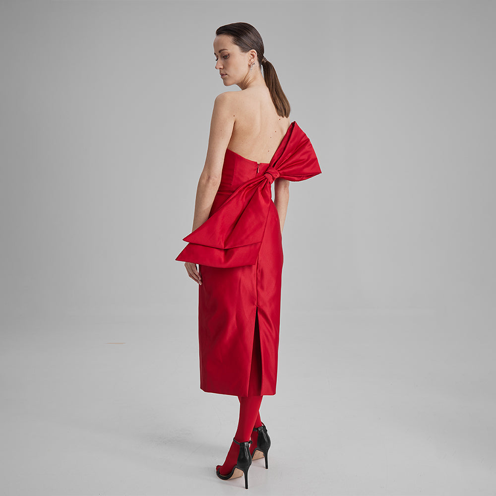 Shop our Kira fitted dress in stunning red color with strapless neckline with a removable side bow. Explore our range of designer dresses. Shop now!