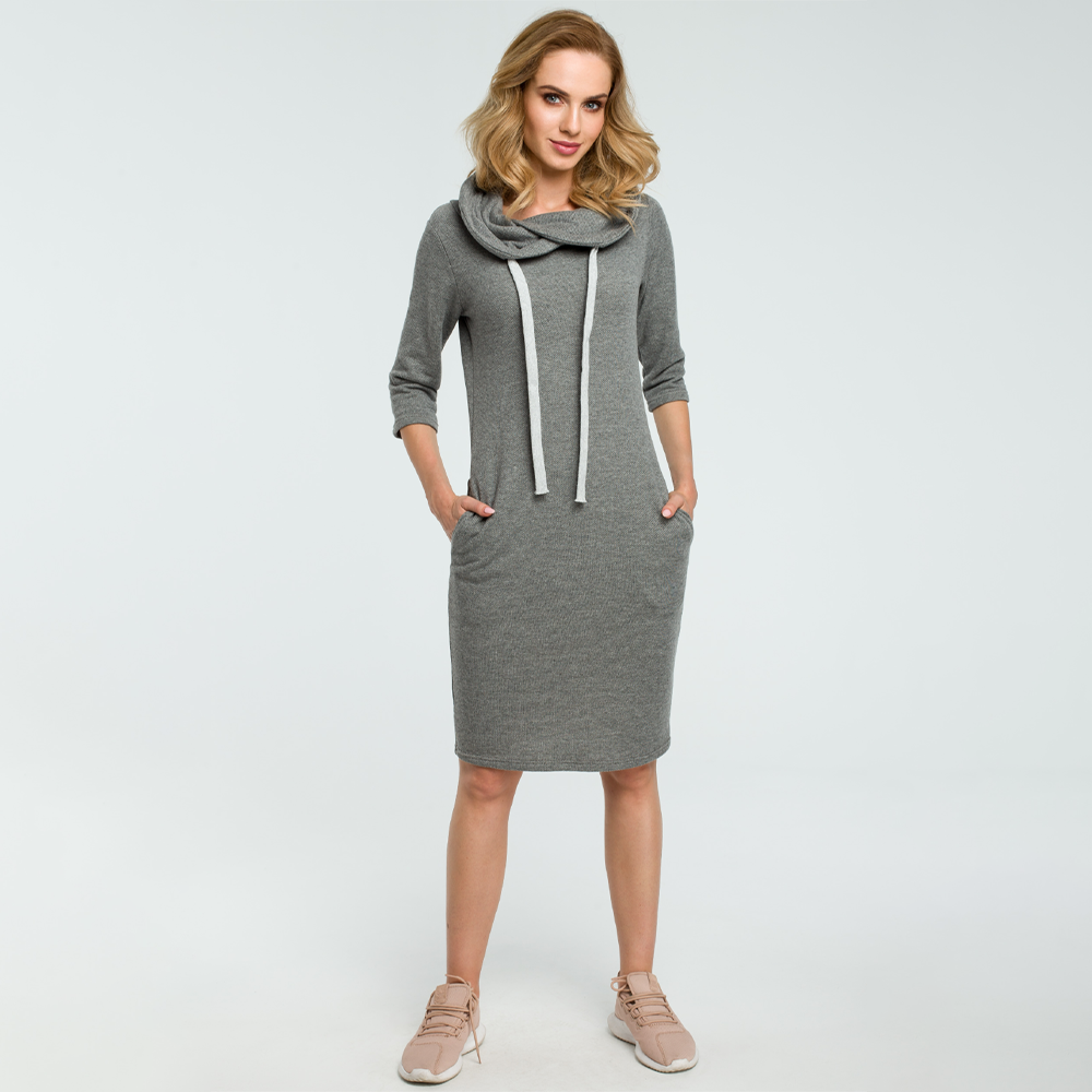 Knit cowl neck dress with tie string and3/4 sleeves.