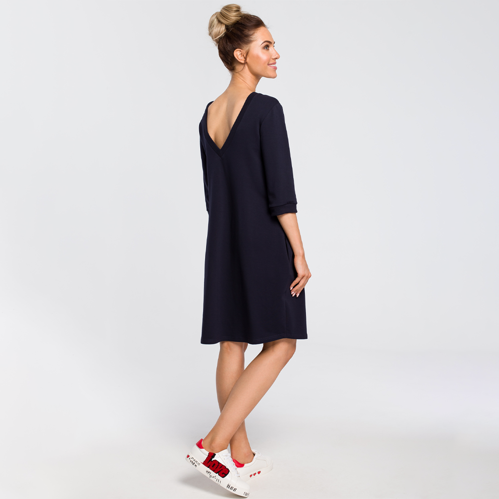 Comfy sweatshirt dress, flattering silhouette with plunging back neck.