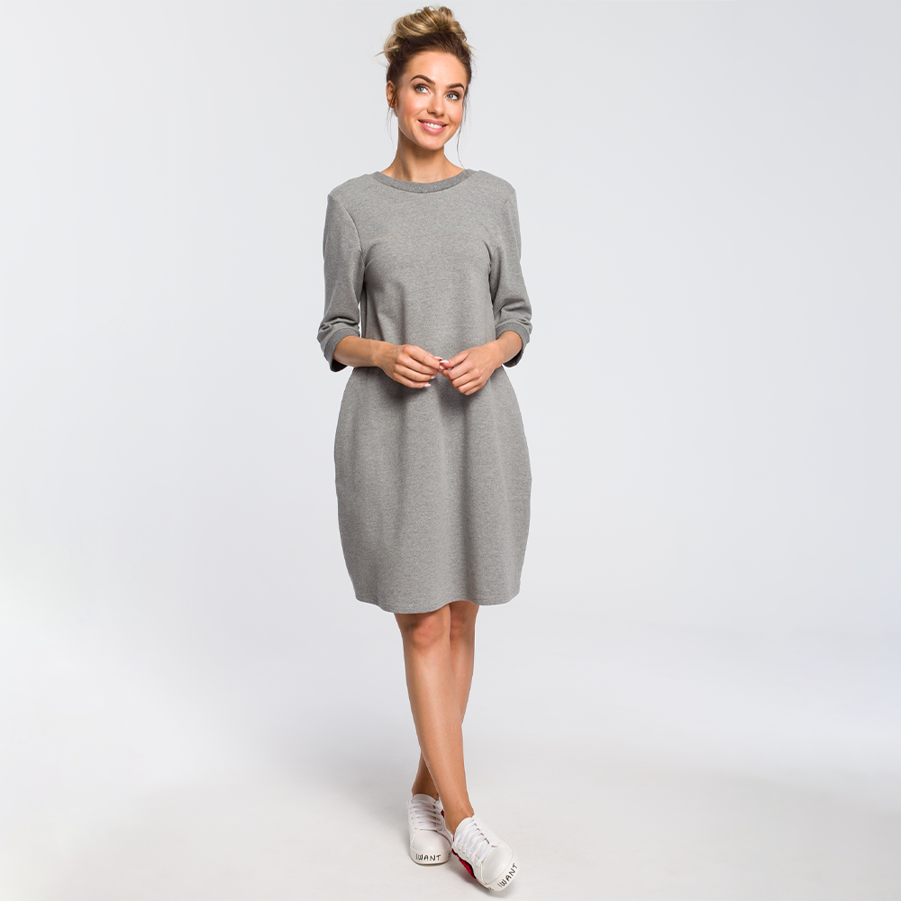 Comfy sweatshirt dress, flattering silhouette with plunging back neck.