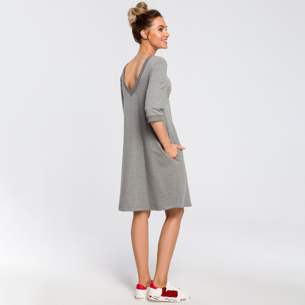 Comfy sweatshirt dress, flattering silhouette with plunging back neck.