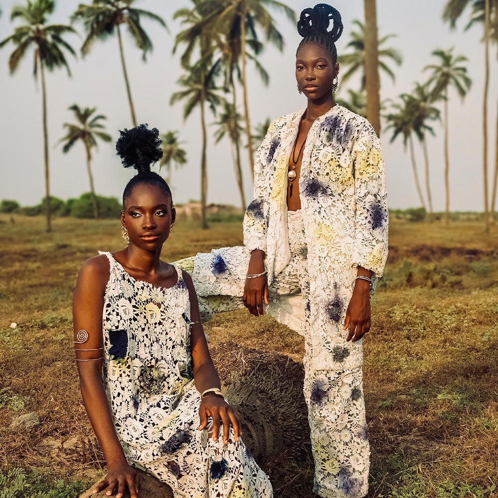 A floor-length pair of pants, featuring vibrant hues of a handmade print on the finest guipure lace, lined with silk organza.