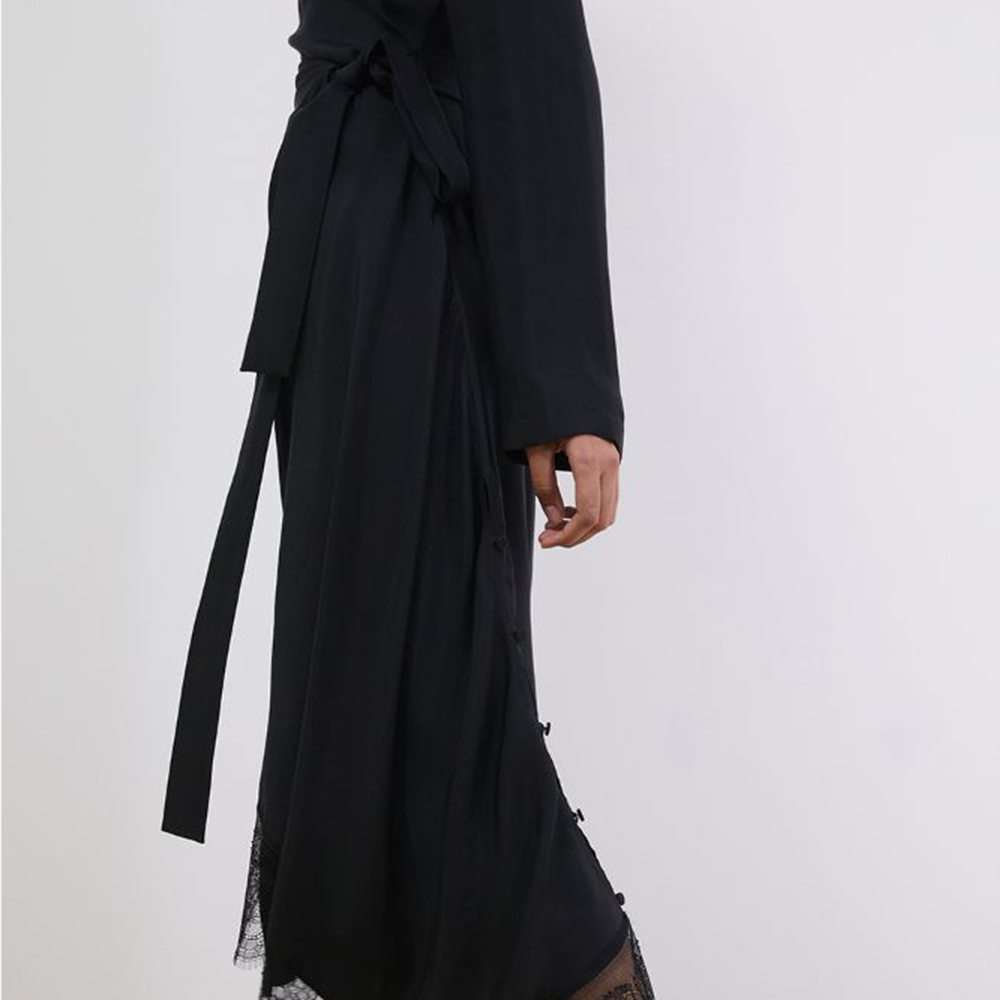 Raw-edged, Round neckline One side handkerchief-hem with patch pocket Adjustable tie belt at waist Relaxed silhouette. 