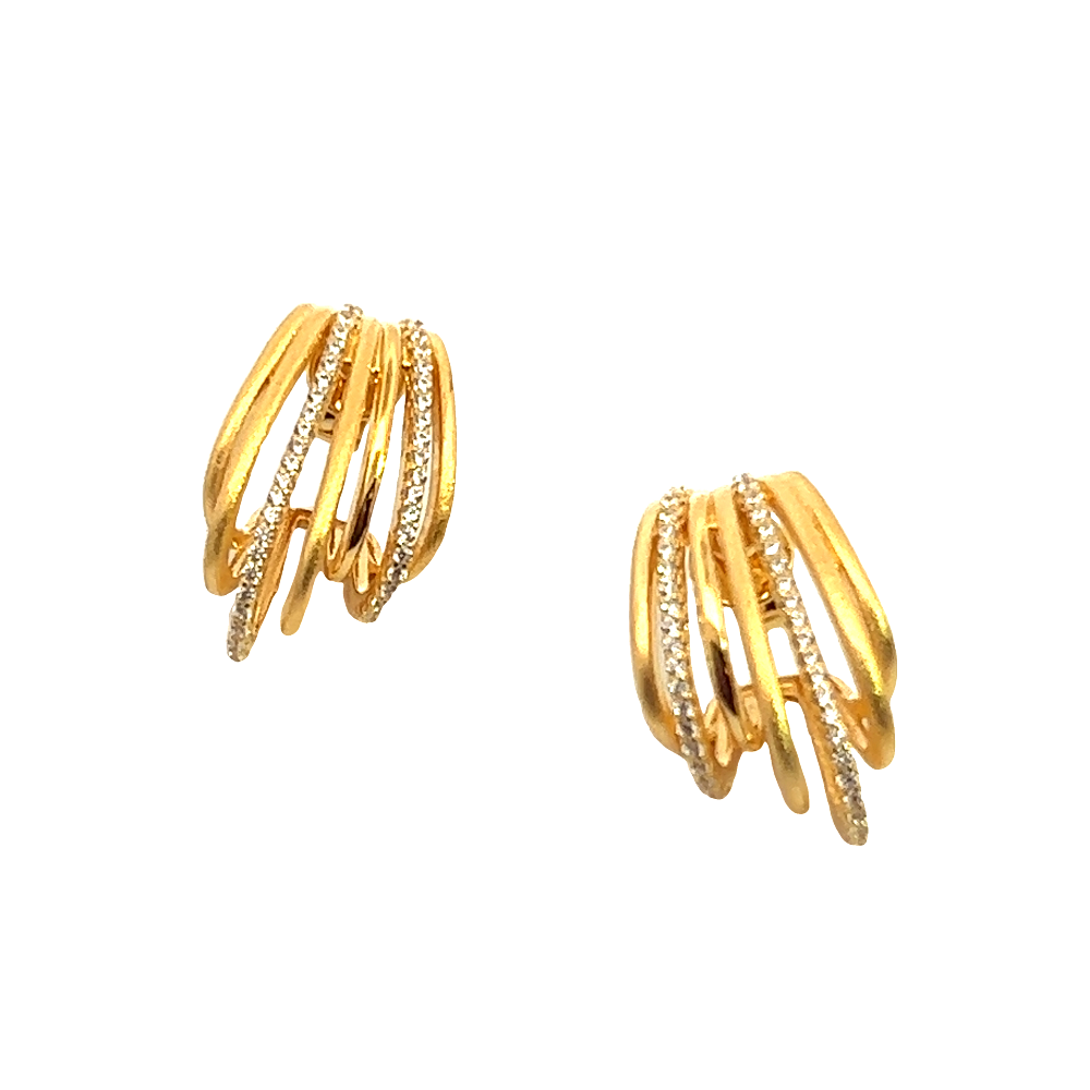 Shop online premium 18K gold huggie earrings with sparkling cubic zirconia stones.