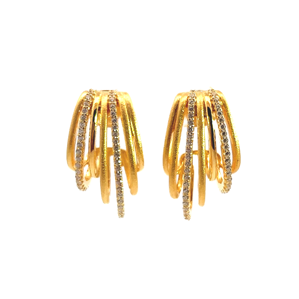Shop online premium 18K gold huggie earrings with sparkling cubic zirconia stones.