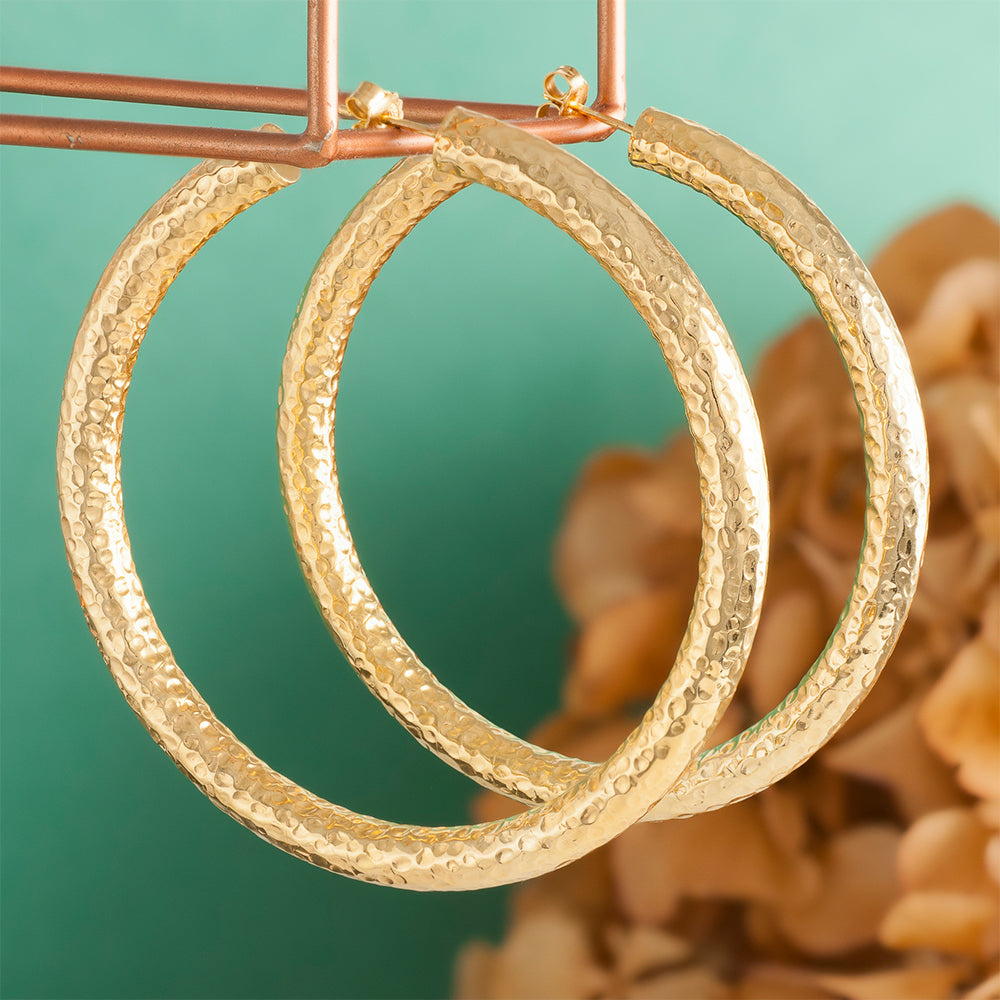 Add a touch of elegance with our Large Gold Hammered Hoop Earrings, available now at our online accessories store. Shop Now!