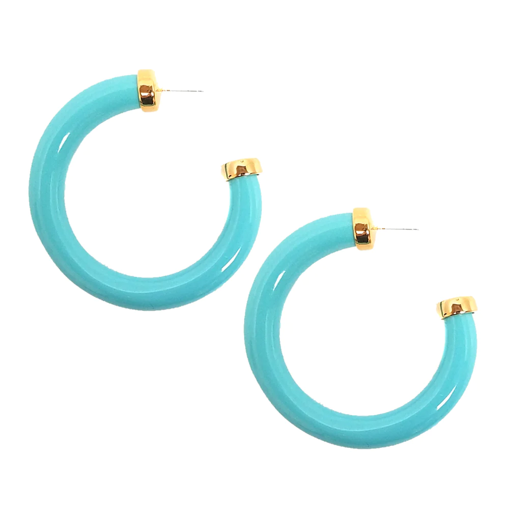 Complete your collection with these resin hoop earrings polished off with gold end caps. 