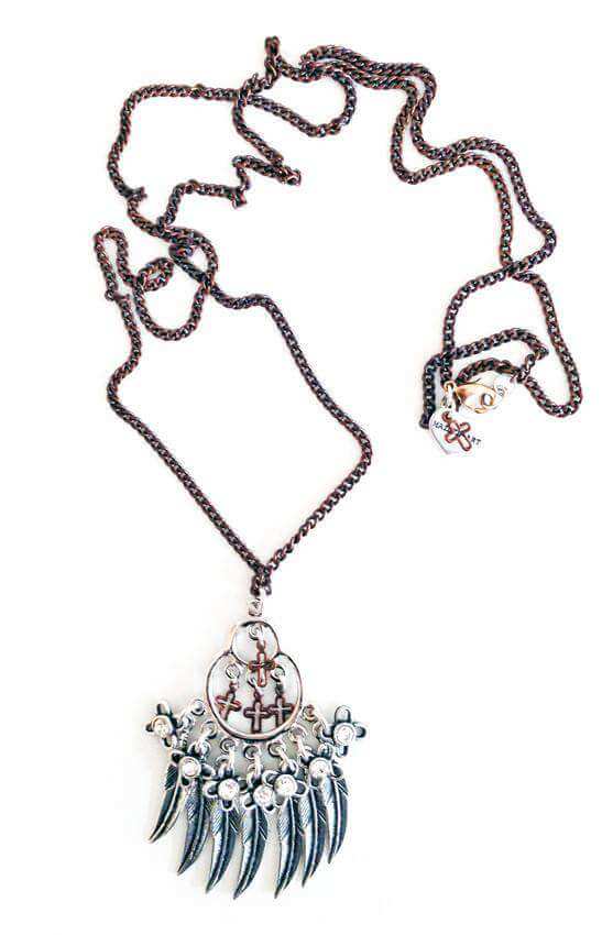 Lariat And Y Necklace is made of silver plated feathers charms, copper crosses and antique silver charms.