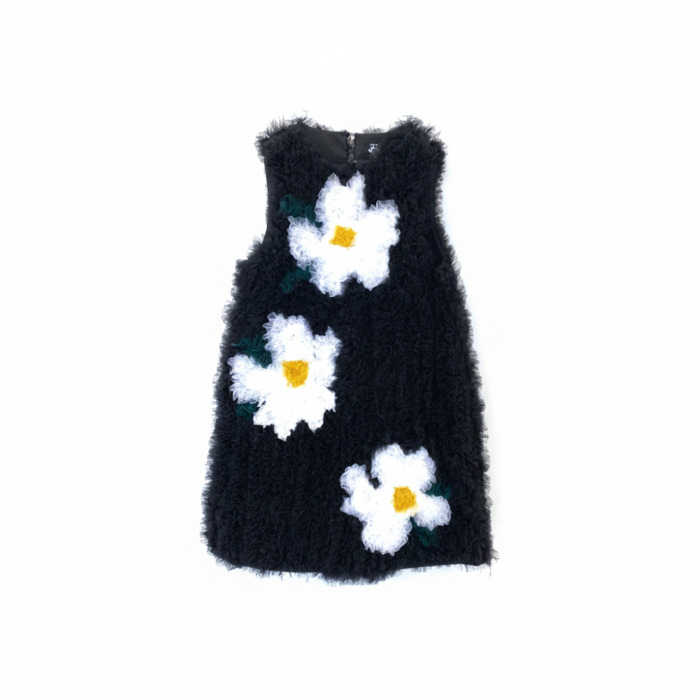 Handmade floral tulle dress with layered silhouette. One-of-a-kind piece. Shop online.