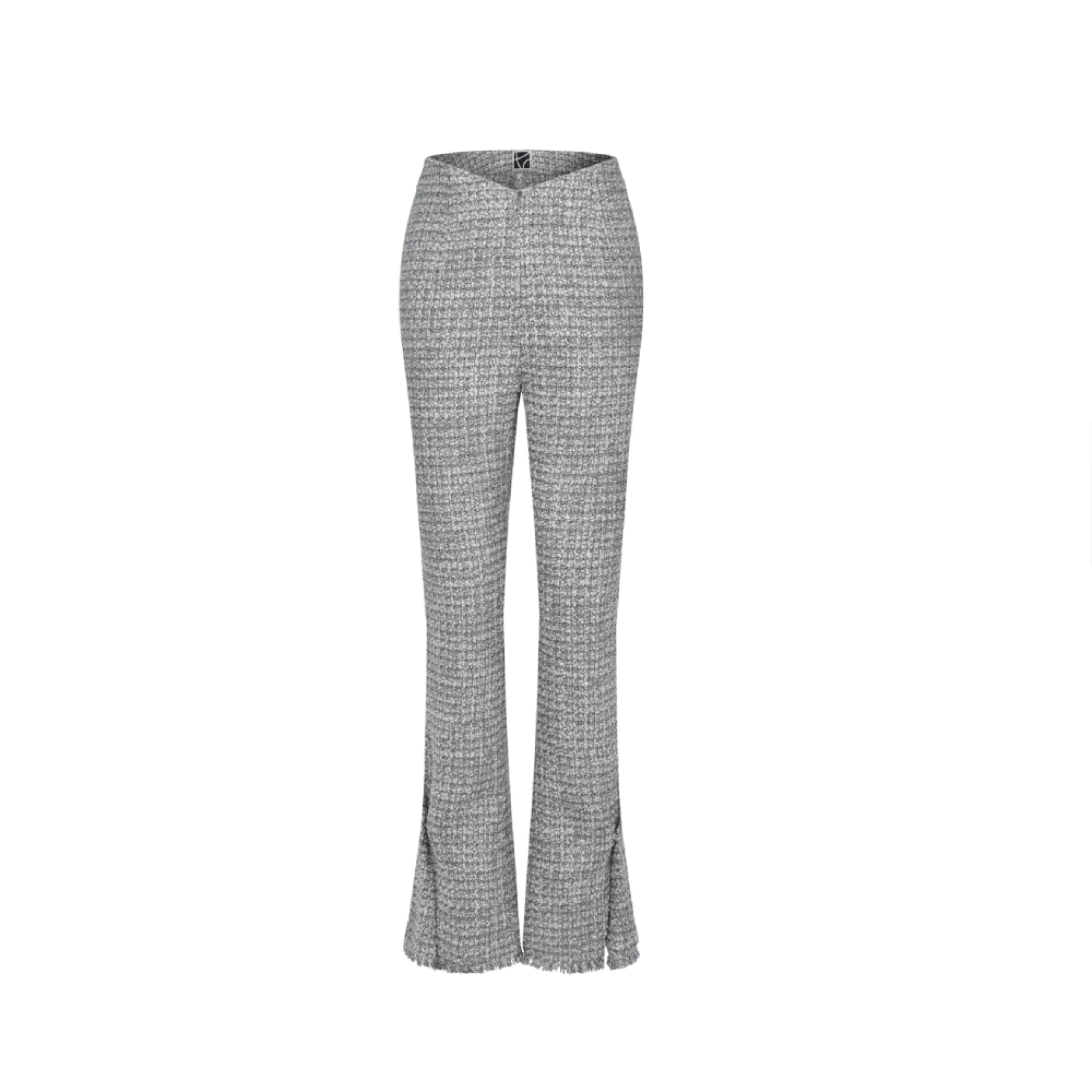 "V" shape waist flared trouser with snap fastener on trouser legs.