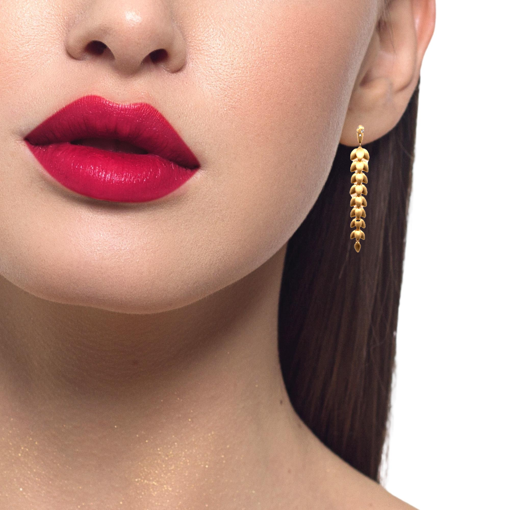 Shop online premium 18K gold leaf shoulder duster earrings with cubic zirconia stones.