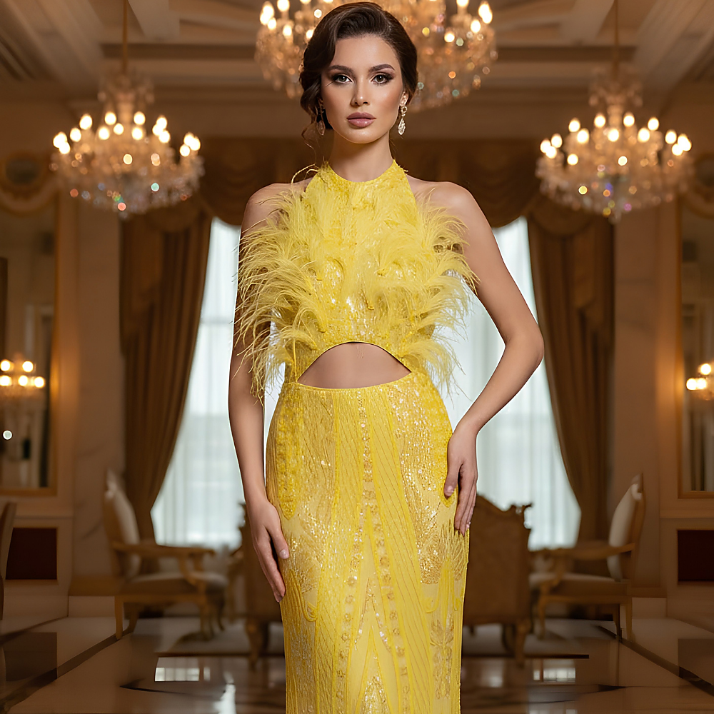 Shop online from our exclusive website. Discover the Leena sunny yellow maxi gown featuring sparkling embellishments, a flattering floor-length silhouette, and timeless elegance for weddings, galas, and special occasions.