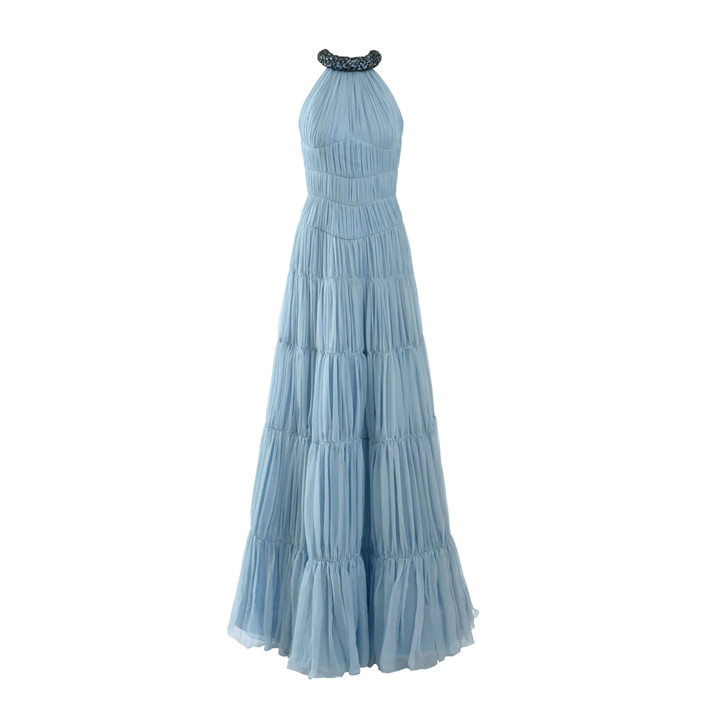 A sky blue chiffon-tiered dress fastened with an embossed choker embroidered with midnight blue crystals.