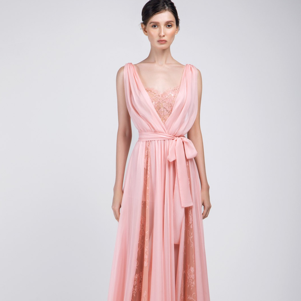 This dress is made of chiffon and lace fabric. Front and back deep V-neck line. Sleeveless, long length, pastel colour.