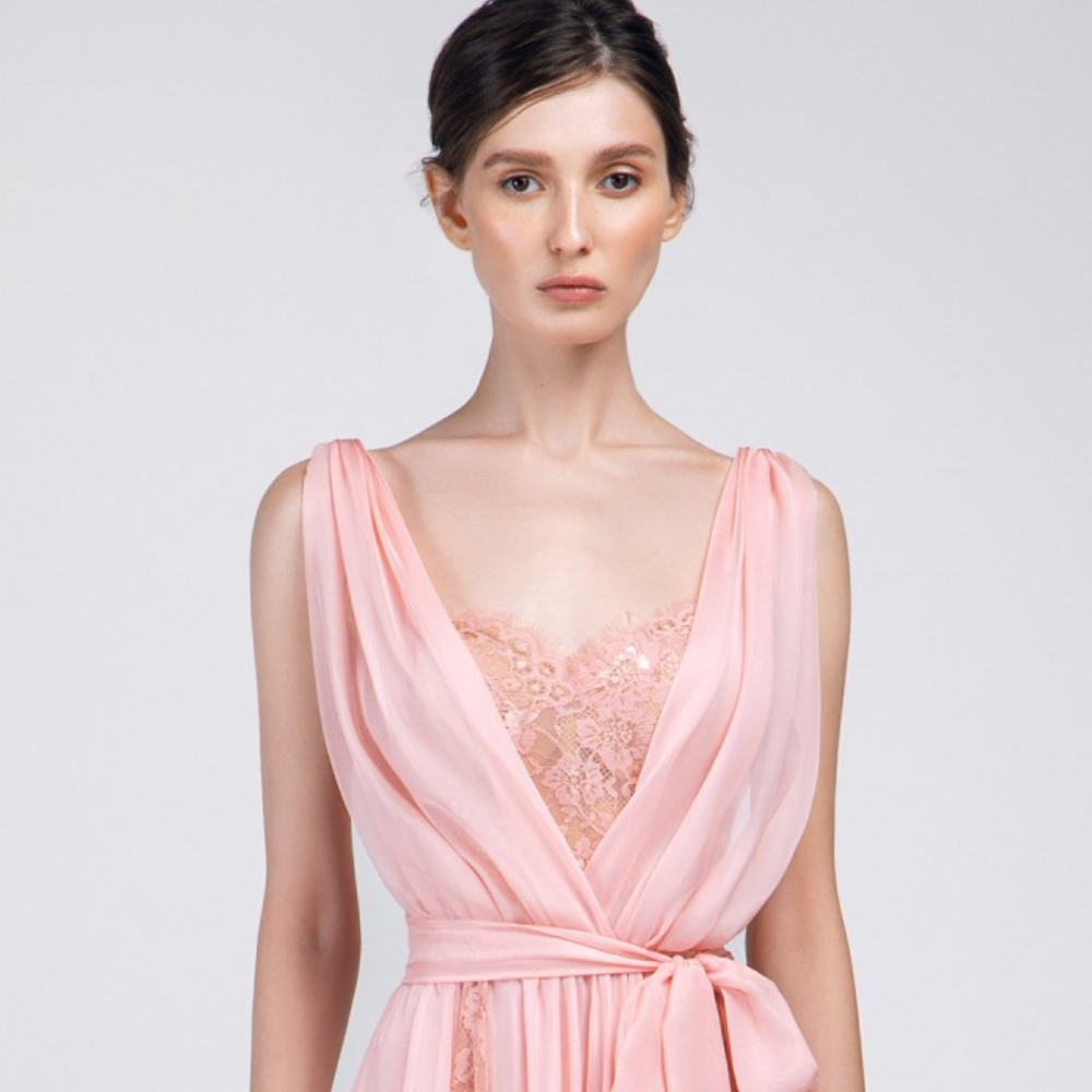 This dress is made of chiffon and lace fabric. Front and back deep V-neck line. Sleeveless, long length, pastel colour.