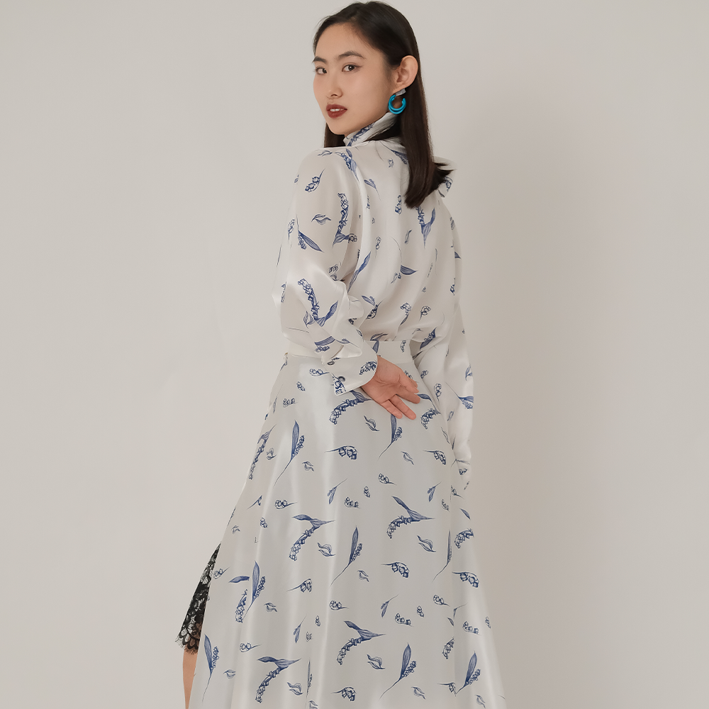 Shop the Lily Button Printed Skirt by Ahkeke London at our online store for clothing. 100% Silk, elegant and stylish. Shop now!