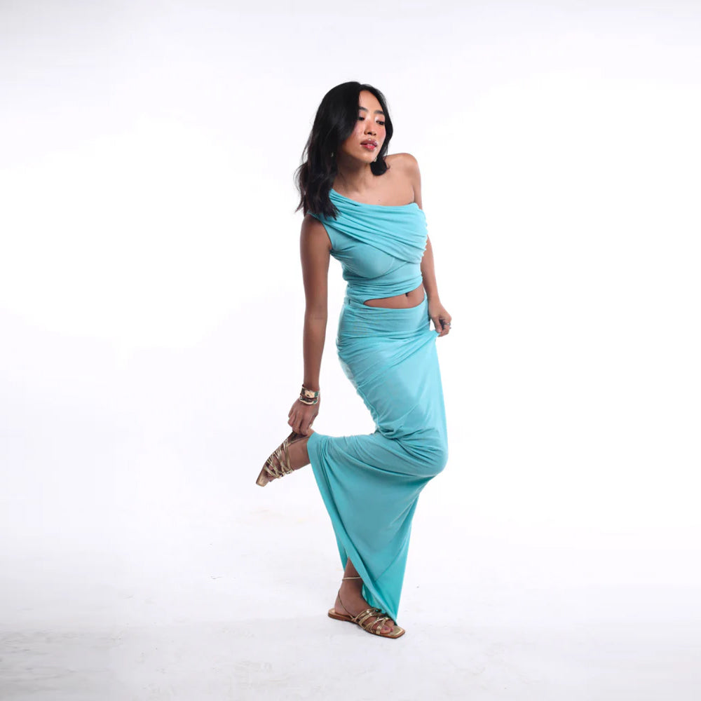 Asymmetrical draped set with fitted silhouette, perfect for beach dinners. Shop online from our curated edit of premium fashion.