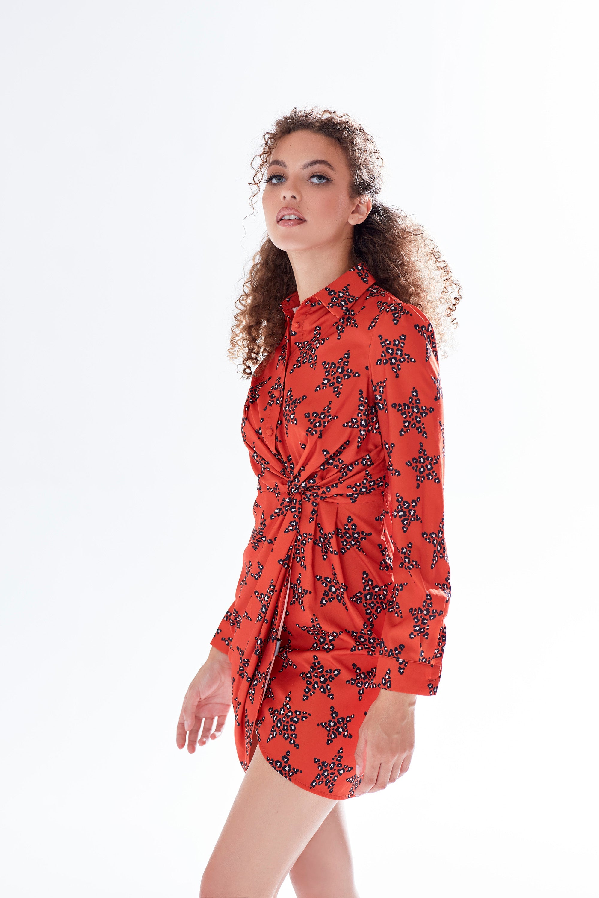 Women's Mini Dress with Collar, Long Sleeves, Twisted Front, and Vibrant Orange Star Print - Liquorish