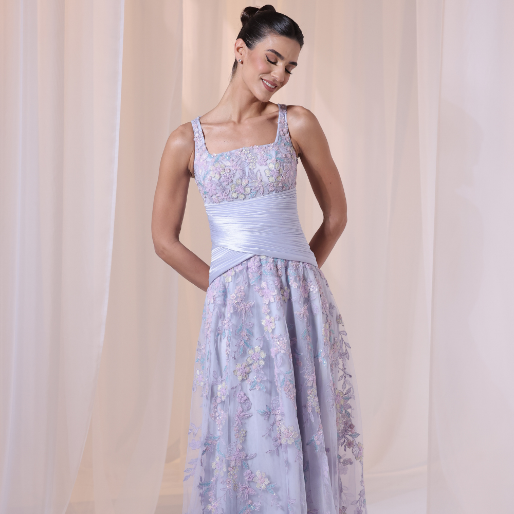 Shop online soft lavender gown with delicate floral embroidery and flowing layered silhouette, perfect for parties, receptions and special occasions.