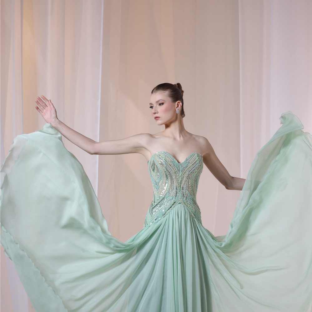 Shop online elegant mint gown with intricately beaded bodice and flowing airy layers, perfect for parties, receptions and special occasions.