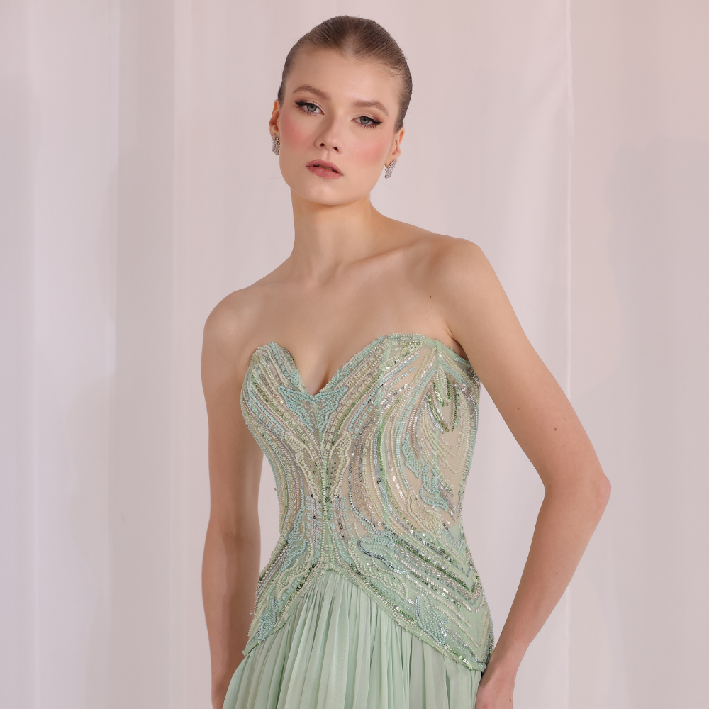 Shop online elegant mint gown with intricately beaded bodice and flowing airy layers, perfect for parties, receptions and special occasions.