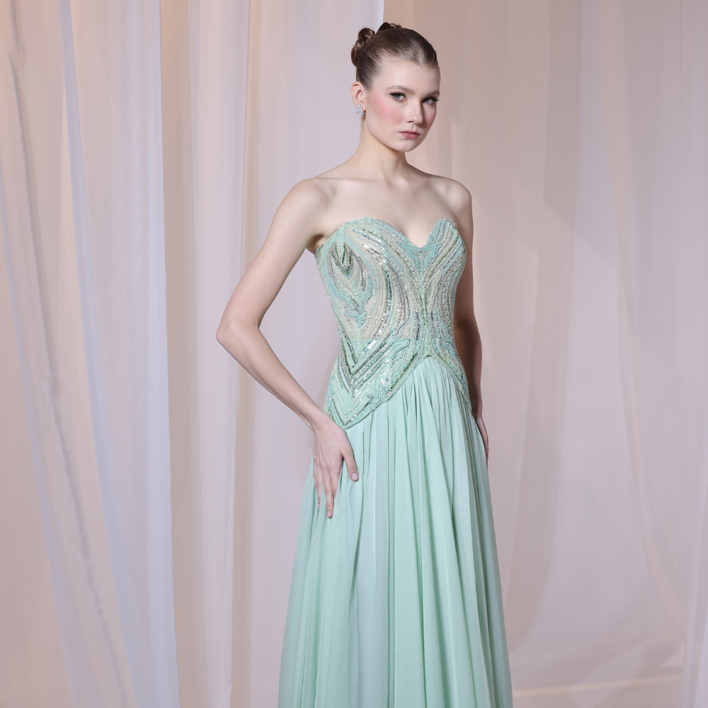 Shop online elegant mint gown with intricately beaded bodice and flowing airy layers, perfect for parties, receptions and special occasions.