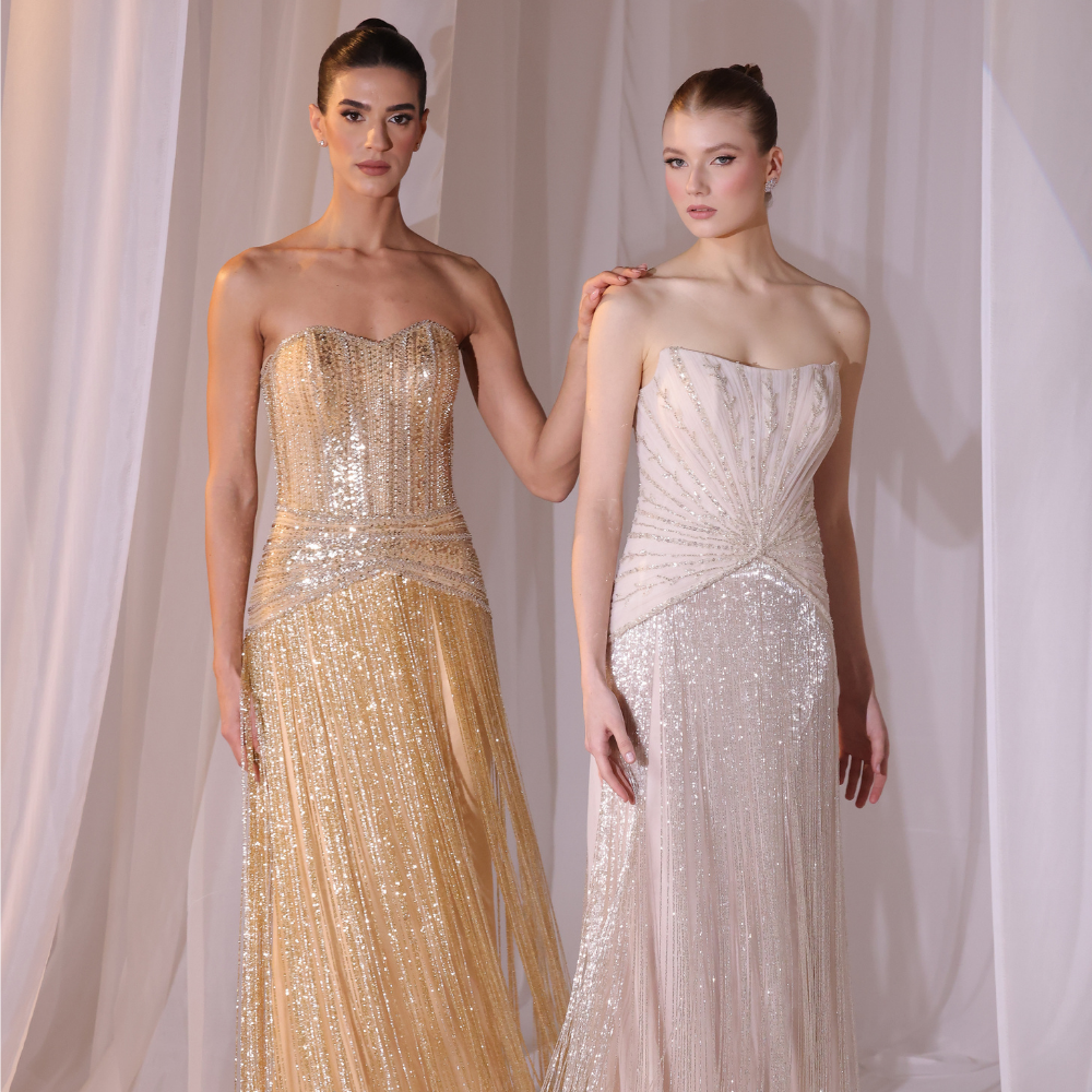 Shop online golden Charleston-inspired gown with fully embellished bodice and shimmering fringe detailing, perfect for parties and special occasions.