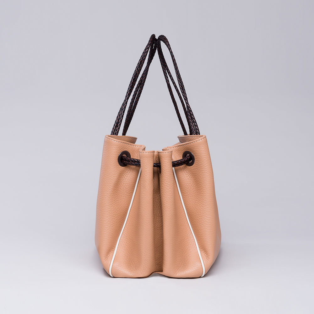 Looking for a stylish accessory? Check out the Lori Themis Nude handbag in our women store. Shop Now!