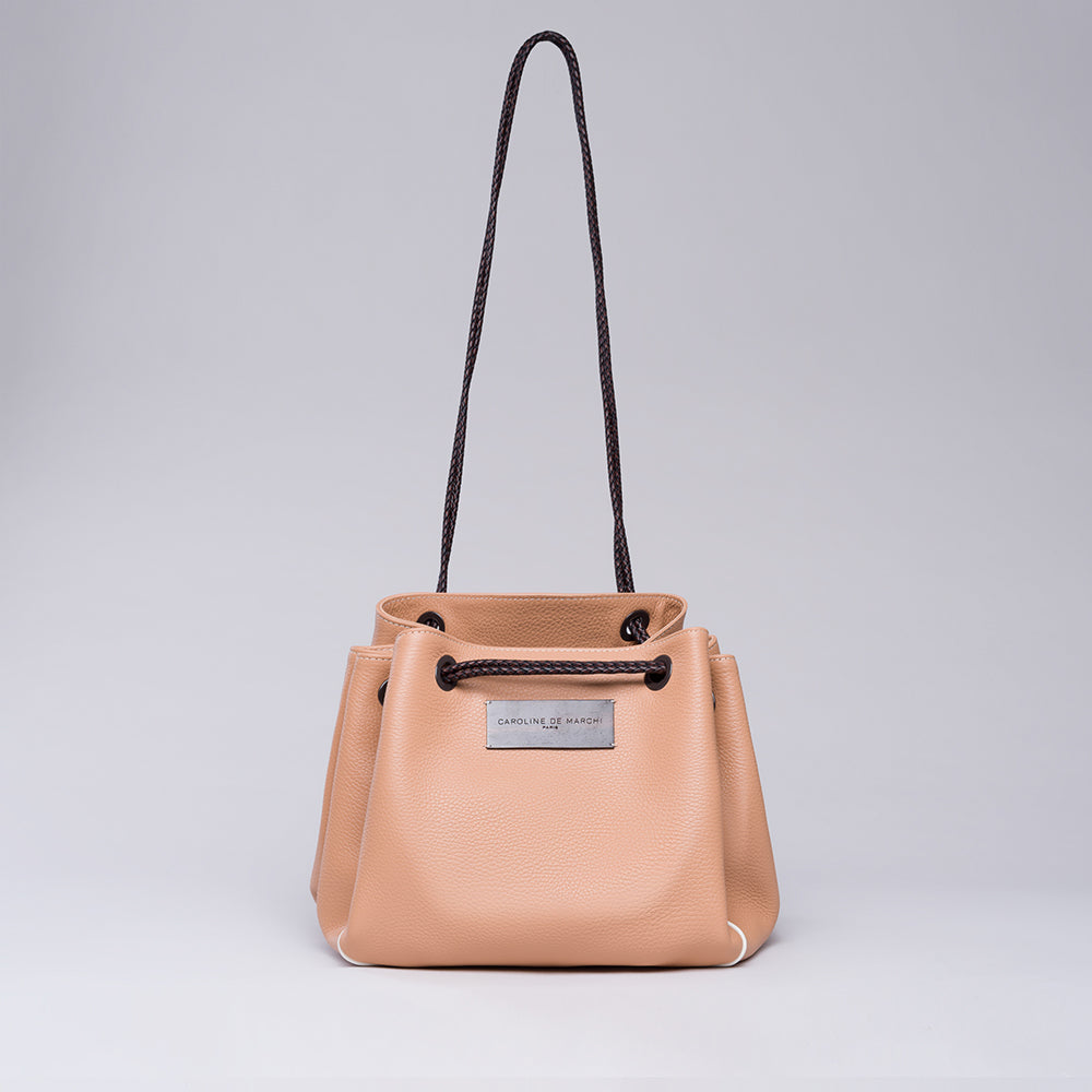 Looking for a stylish accessory? Check out the Lori Themis Nude handbag in our women store. Shop Now!