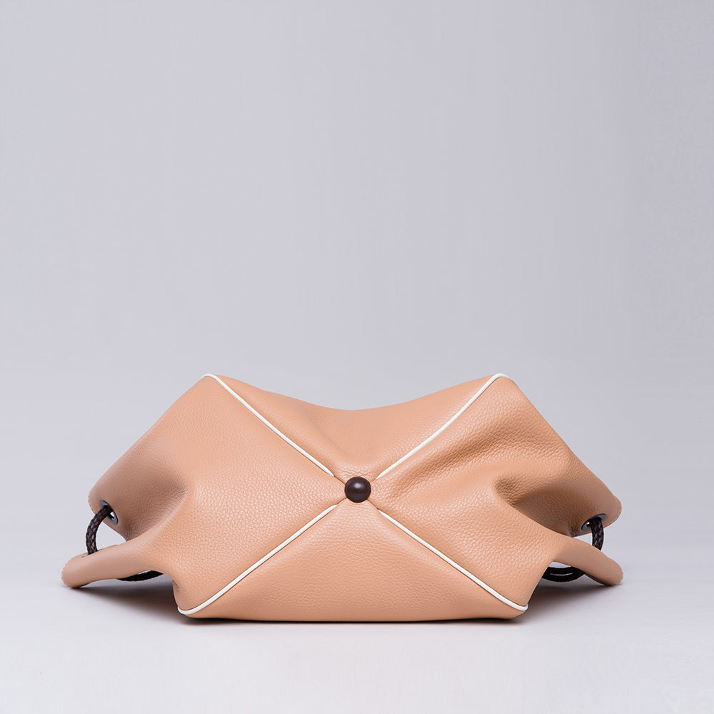 Looking for a stylish accessory? Check out the Lori Themis Nude handbag in our women store. Shop Now!