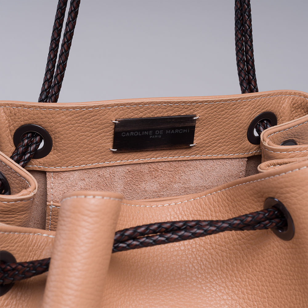 Looking for a stylish accessory? Check out the Lori Themis Nude handbag in our women store. Shop Now!