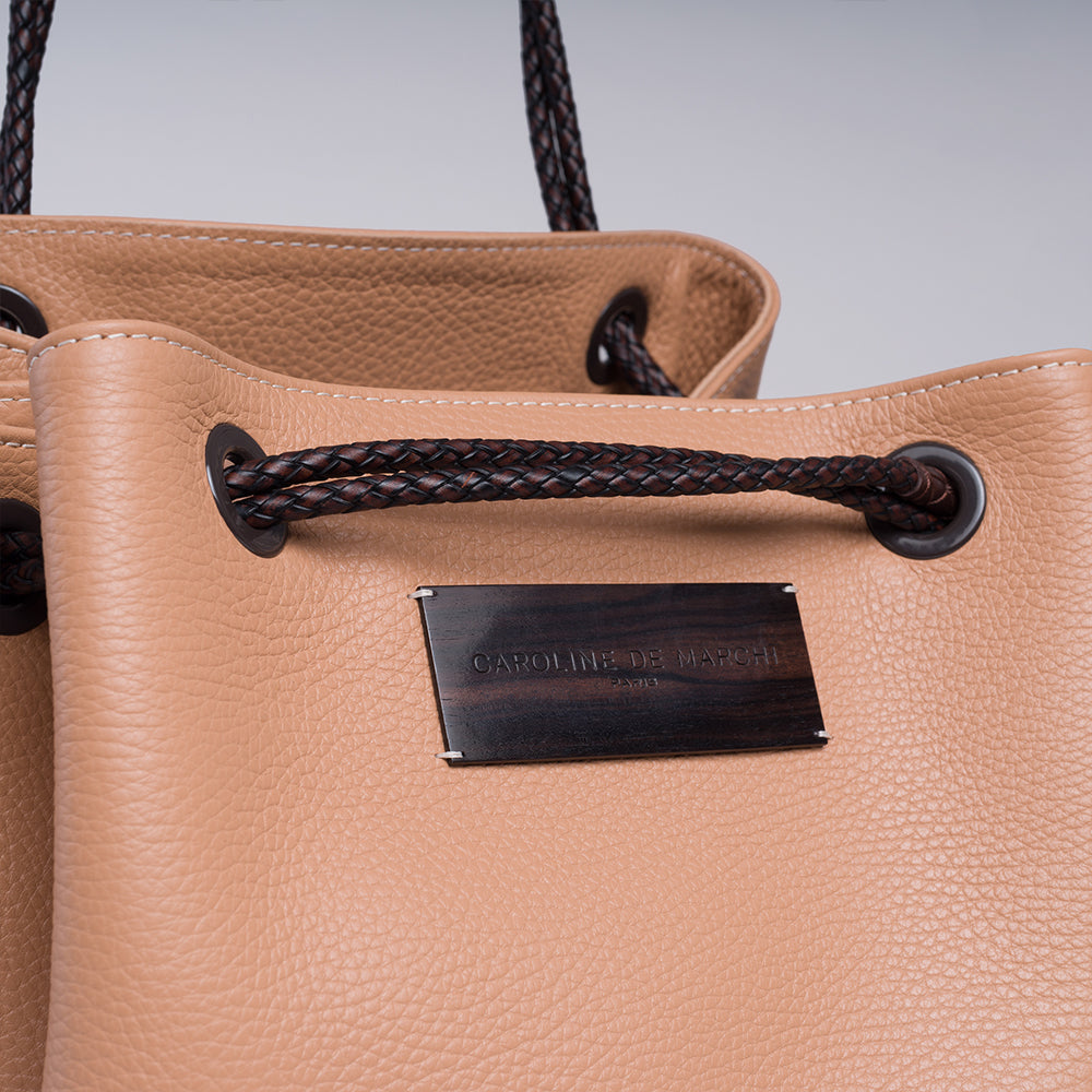 Looking for a stylish accessory? Check out the Lori Themis Nude handbag in our women store. Shop Now!