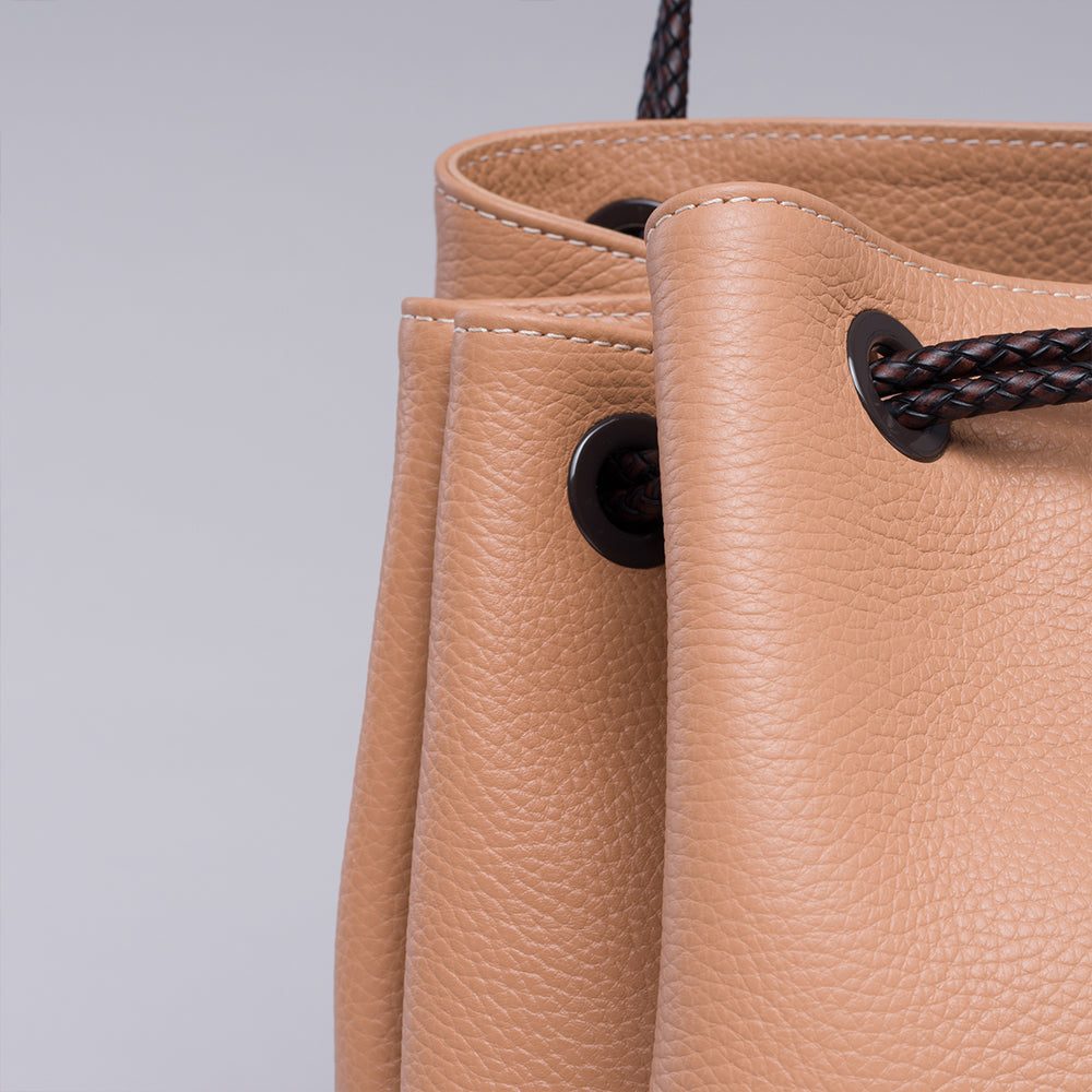 Looking for a stylish accessory? Check out the Lori Themis Nude handbag in our women store. Shop Now!