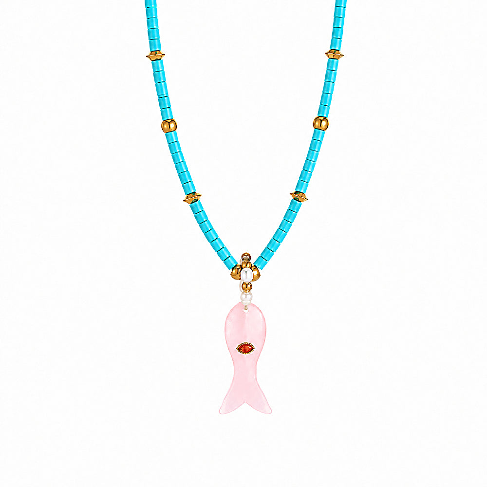 Discover the Love Fish Turquoise & Rose Quartz Beaded Necklace at The Luxe Maison, featuring vibrant turquoise beads and a rose quartz fish pendant for a playful, colorful look inspired by love and the sea.