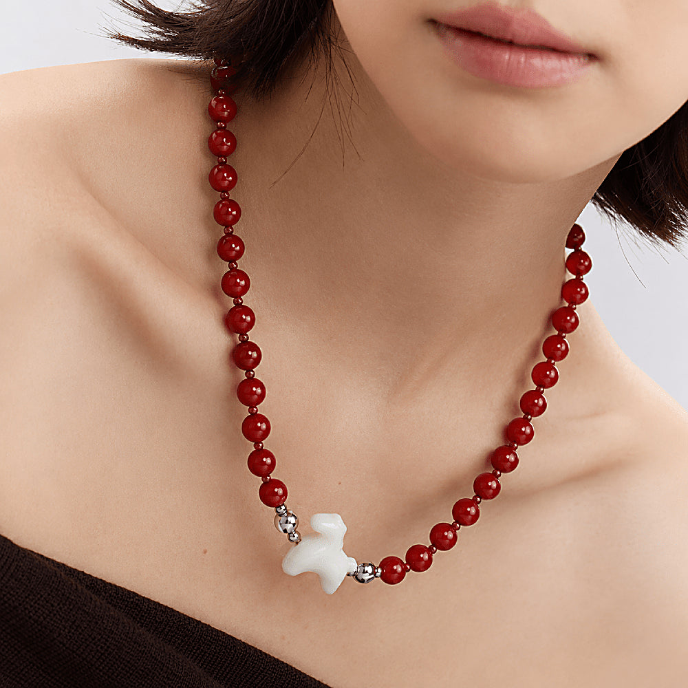 Discover the Lucky Horse Carnelian & White Jade Necklace at The Luxe Maison, featuring vibrant gemstone beads, colorful quartz, watermelon tourmaline, and sterling silver accents.