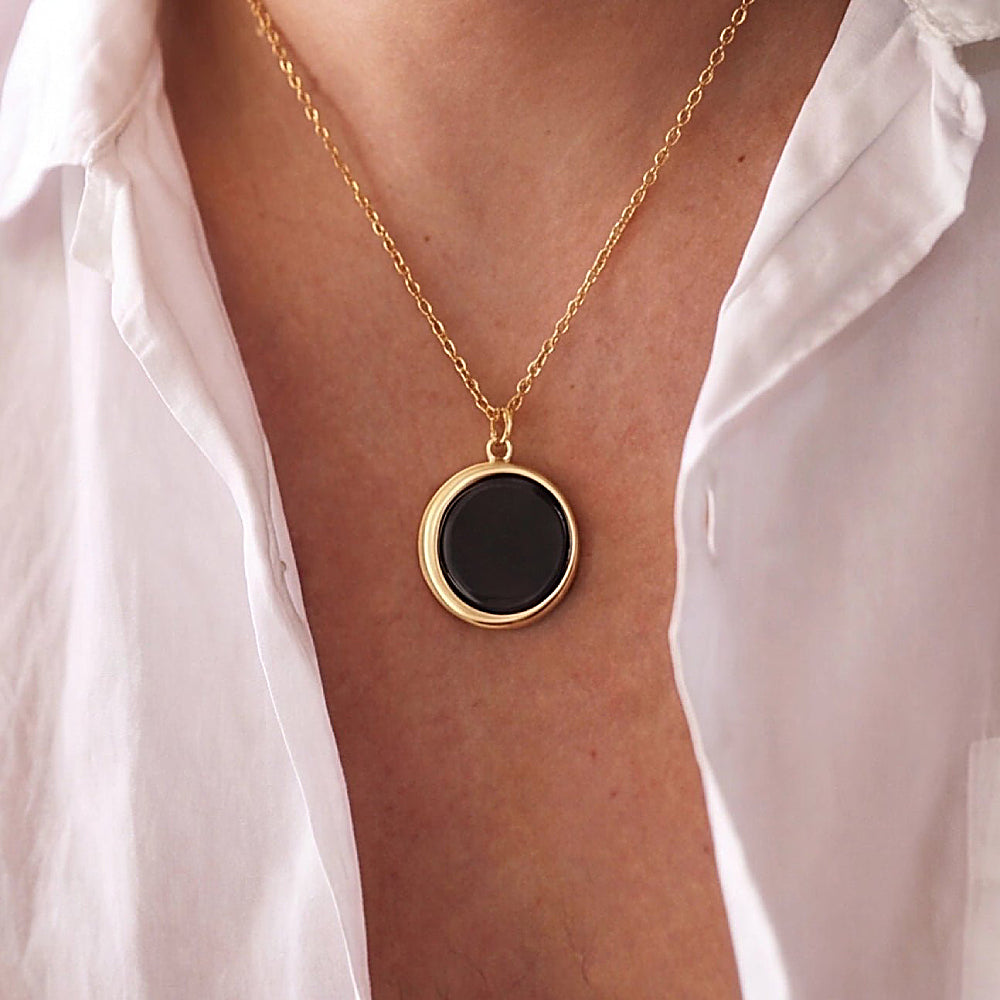 Discover the Luna Shungite Necklace at The Luxe Maison, featuring shungite stone in a distinctive design for those drawn to natural stone jewelry.