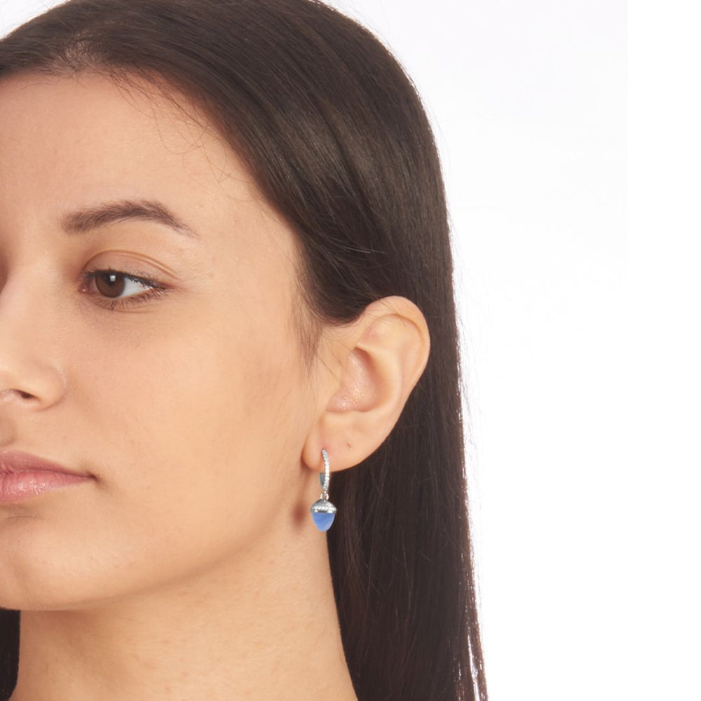Shop online premium rhodium plated crescent earrings with light blue chalcedony pyramidal crystal and sparkling cubic zirconia accents for elegant styling.