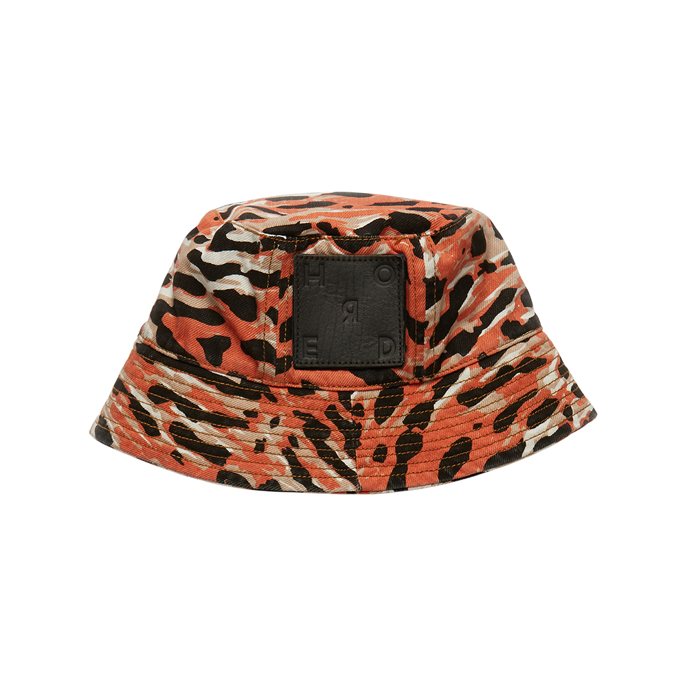 Mona Bucket Hat is crafted from printed fine cotton denim with saffron topstitching and a 90's-inspired black embossed logo