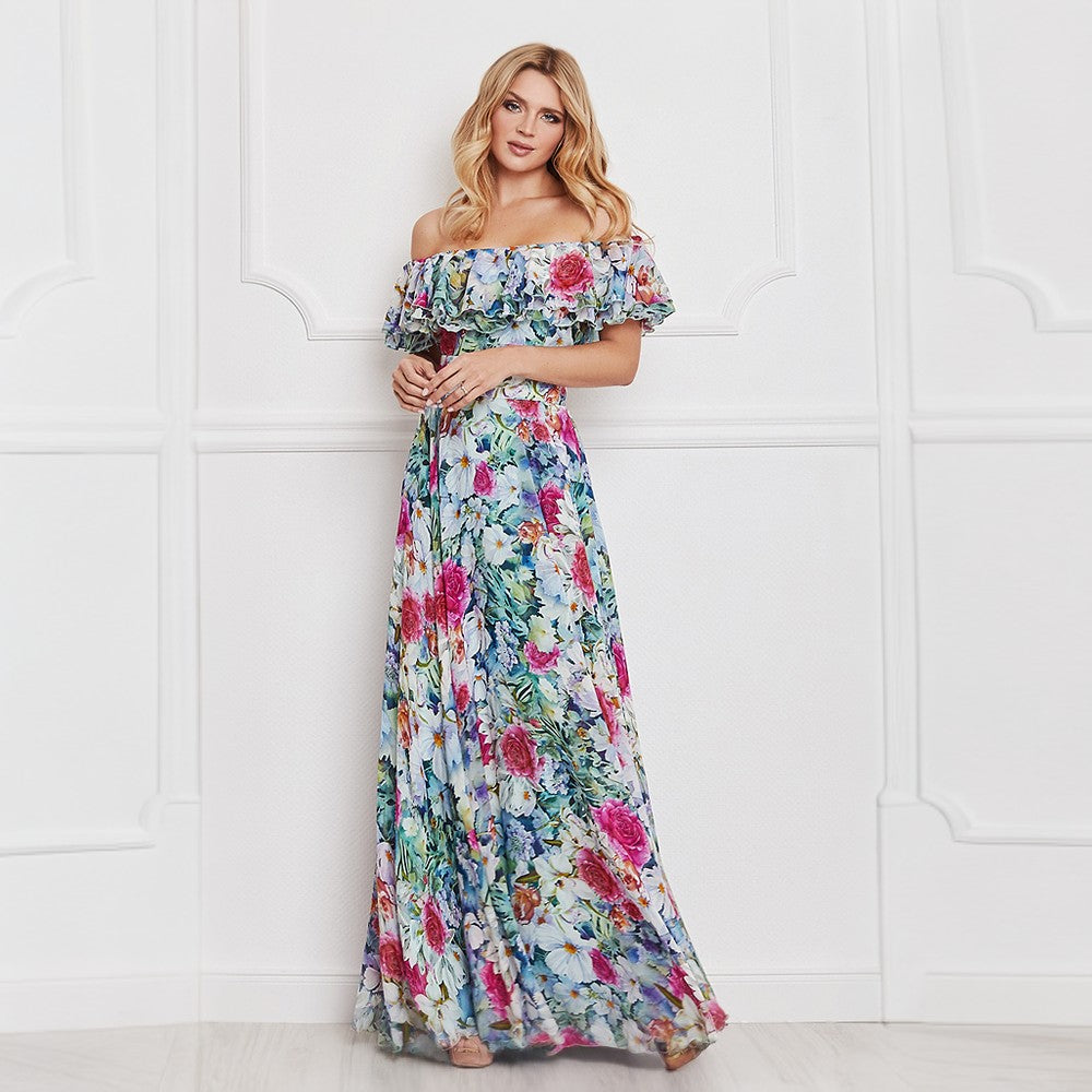 This silk maxi dress is romanced with floral work. Off-shoulder and playfully detailed with ruffle trim.